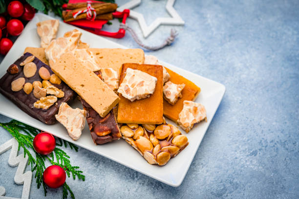 istock Variout types of Spanish turron on Christmas table 1263832338
