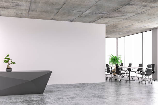 istock Modern interior with conference table and chairs and reception desk side view 1263839221