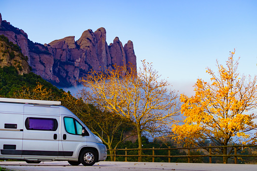 Caravan in Montserrat mountain range near Barcelona in Catalonia Spain. Tourist attraction. Place to visit. Traveling with motor home.
