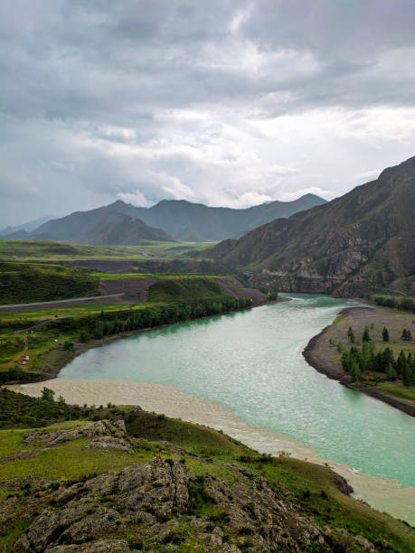 istock Blue river. The confluence of two mountain rivers. View from above 1263849982