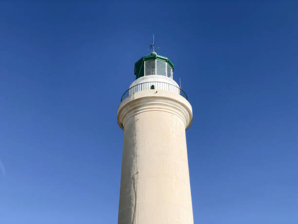 istock a lighthouse over blue sky with copy space in a sunny day 1263851809