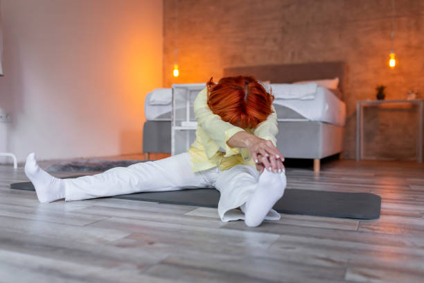 istock Senior woman stretching out 1263851827