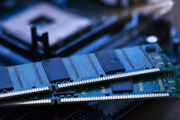 istock Pair of computer Memory RAM placed on mainboard or motherboard 1263853919