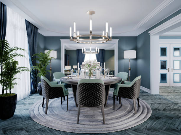 istock Modern luxurious dining room in blue, white and black color with a large round served table and chairs. 1263854783