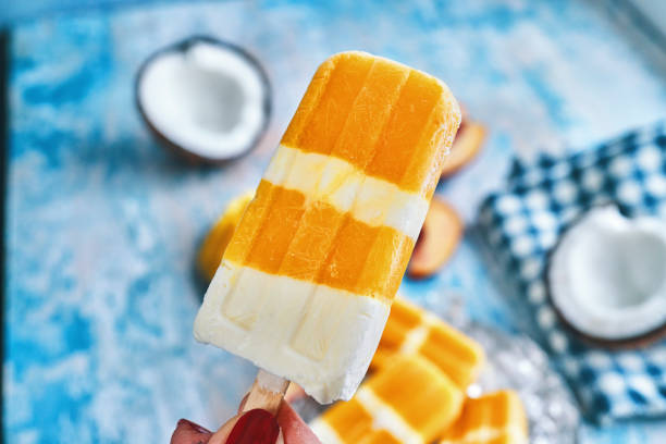 istock Mango Peach Yogurt Ice Cream on Stick 1263855383