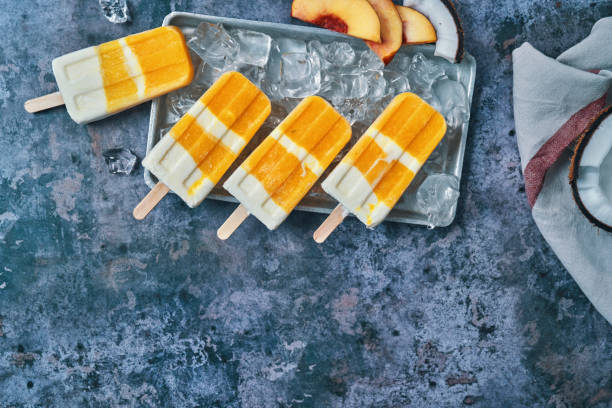 istock Mango Peach Yogurt Ice Cream on Stick 1263855684