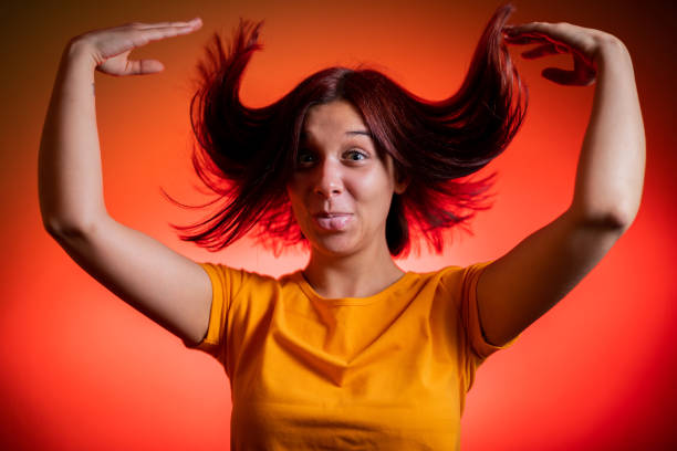 istock Woman with flying hair 1263857593