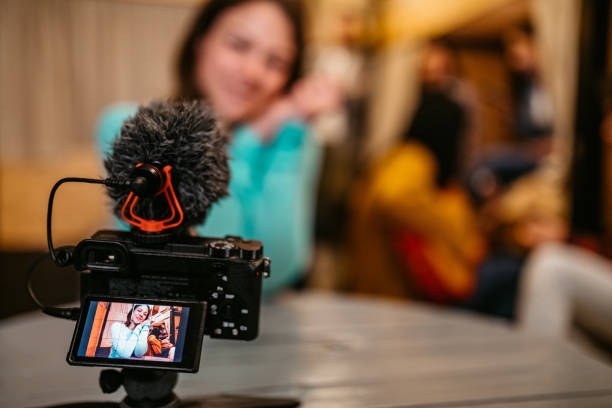 istock Woman vlogging from her hostel room 1263859264