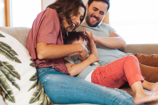 istock Young family having fun at home 1263861908