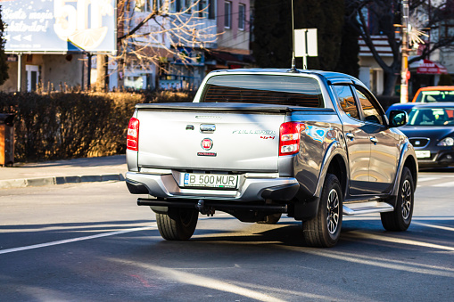 Berlin, Germany - 18th November, 2022: Electric pick-up Ford F-150 Lightning parked on a road. This model is the first mass-produced zero-emission pick-up from Ford.