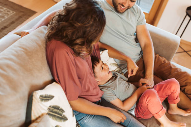 istock Young family having fun at home 1263861932