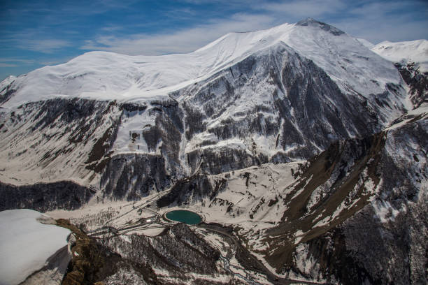 istock Caucasus Mountains in the spring day 1263864851