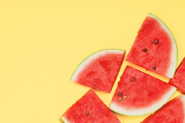 istock Sweet watermelon slice on yellow background 1263865019