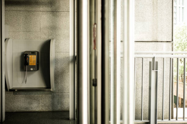 istock Close up on public telephone in a modern building. 1263873815