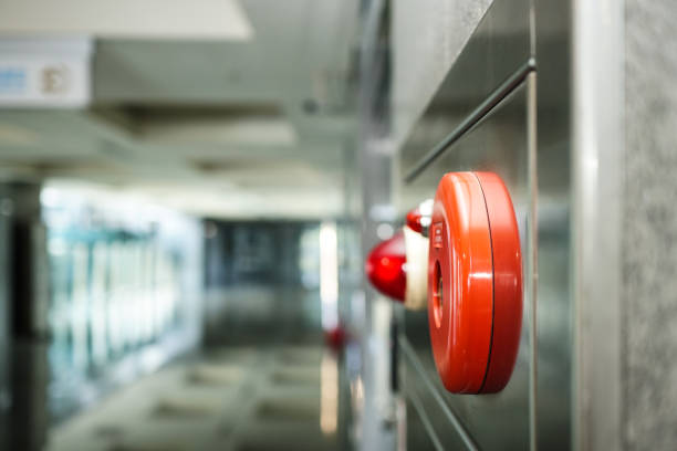 istock Alarm bells and warning lights for avoiding fire in a modern building. The subject is on the right. 1263875723