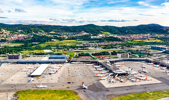 Istanbul, Turkey - June 3, 2023: Turkish Airlines airplane with Air Traffic Control Tower of Istanbul Airport. View of international Istanbul New Airport.