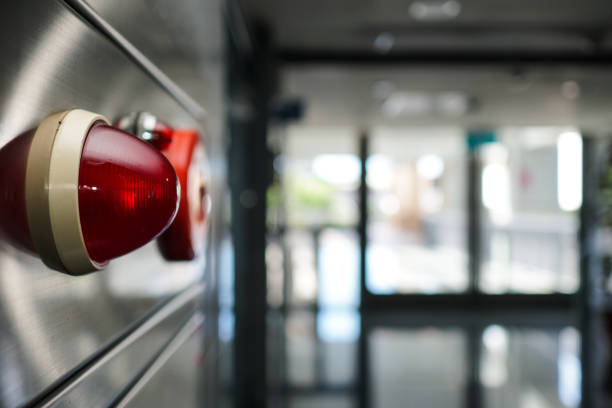 istock Alarm bells and warning lights for avoiding fire in a modern building. The subject is on the left. 1263876306