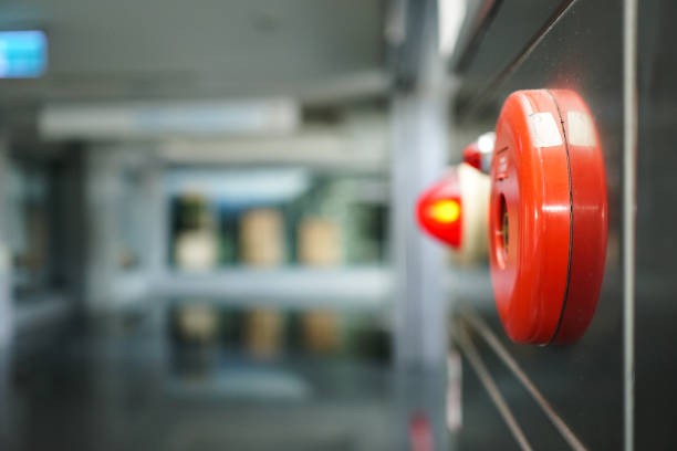 istock Alarm bells and warning lights for avoiding fire in a modern building. The subject is on the right. 1263876335