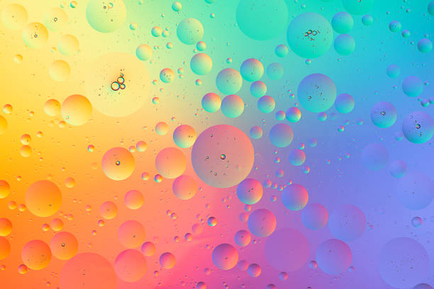 istock Oil bubbles on water macro photography abstract colorful background 1263876381