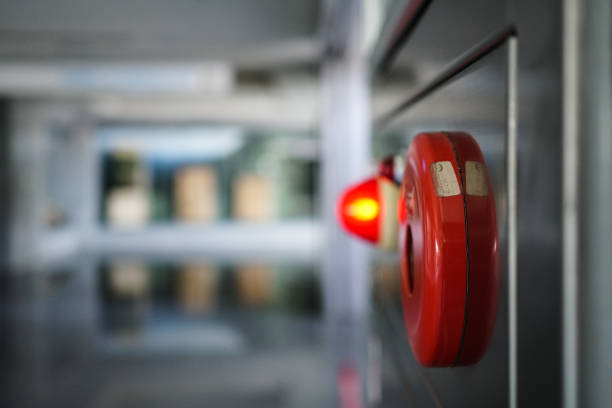 istock Alarm bells and warning lights for avoiding fire in a modern building. The subject is on the right. 1263876420