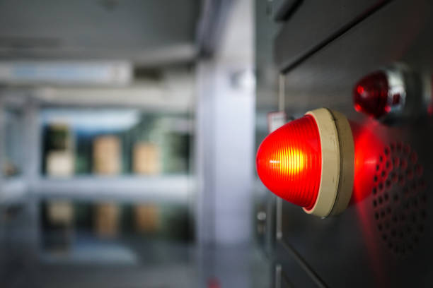 istock Alarm bells and warning lights for avoiding fire in a modern building. The subject is on the right. 1263876456