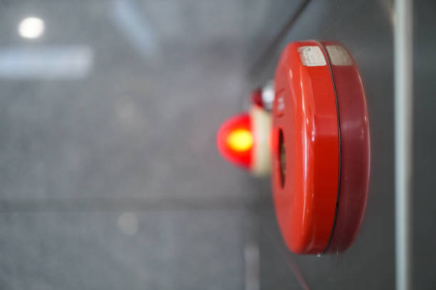 Alarm bells and warning lights for avoiding fire in a modern building. The subject is on the right.