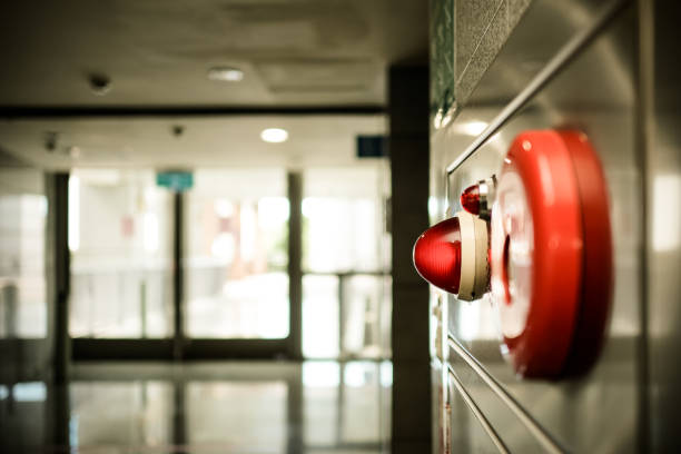istock Alarm bells and warning lights for avoiding fire in a modern building. The subject is on the right. 1263876722