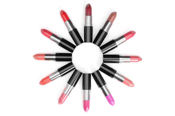 istock Lipsticks of different colors arranged in a circle on white background. 1263877798