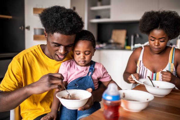 istock Family having breakfast in the kitchen 1263880745