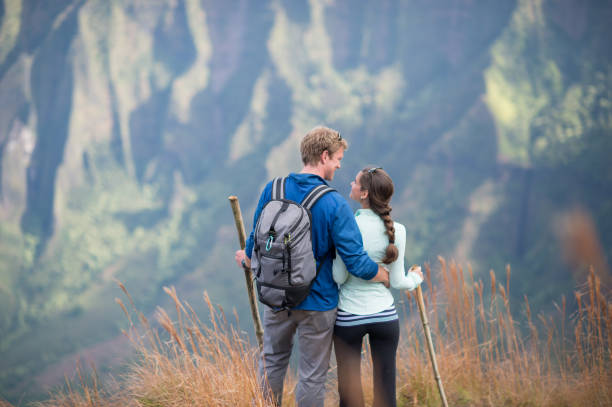 istock Couple goes on romantic scenic hike 1263881858