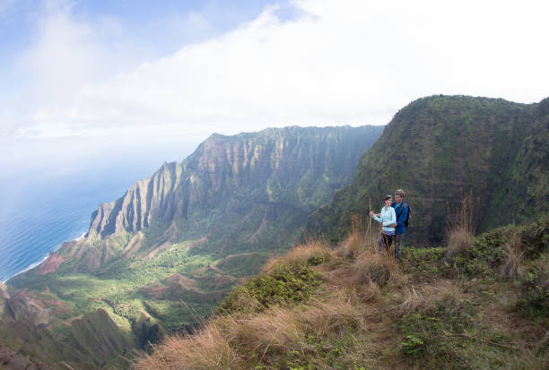 istock Couple goes on romantic scenic hike 1263881885
