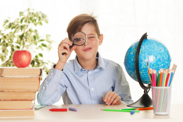 istock Young schoolboy is going to do homework 1263882381