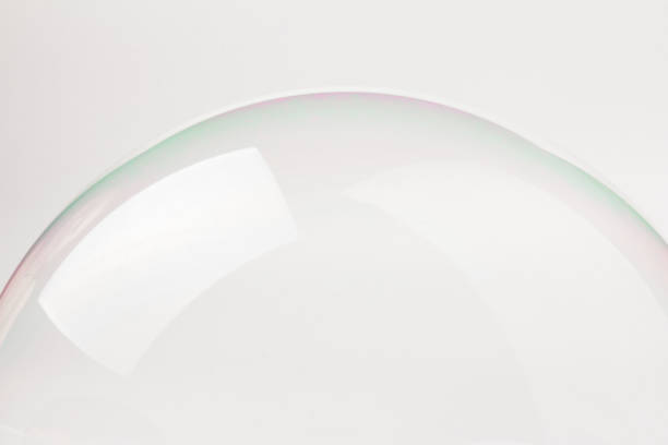 istock half one big multicolored soap bubble with glares on gray background 1263886487
