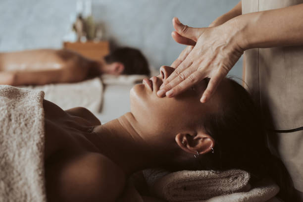 istock Woman enjoying massage in Spa 1263887525