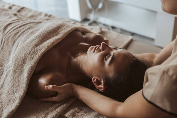 istock Woman enjoying massage in Spa 1263887529