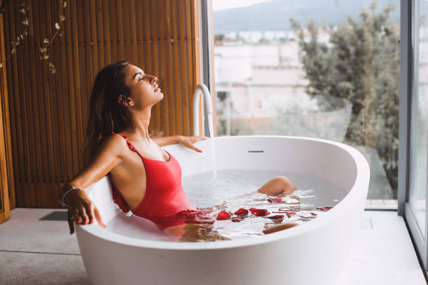 istock Woman in a modern bath tub 1263887552