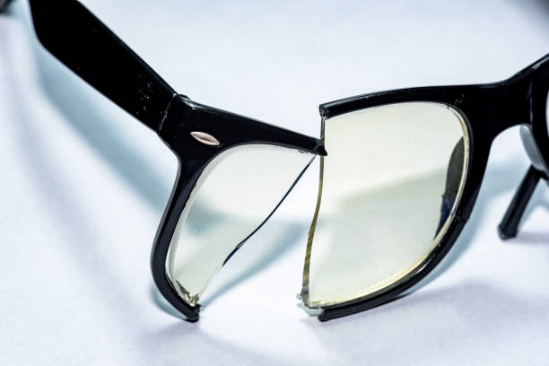 istock Close up of Broken glasses on White Background. 1263887612