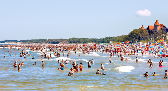 Łeba, Poland - August 01.2020: People on beach in Łeba