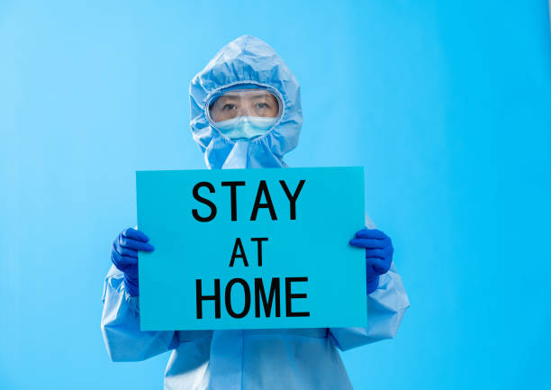 istock Doctor holding a paper that says stay 1263893128