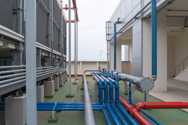 istock Chiller tower or cooling tower on rooftop of a office building. System work. Architecture machine. Condenser Water Supply (CDS) and Condenser Water Return (CDR) pipe lines. Ventilation compressor. 1263895002