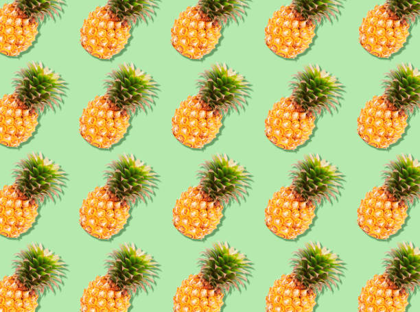 istock The texture colorful fruit pattern of pineapple fruit on green background 1263895006