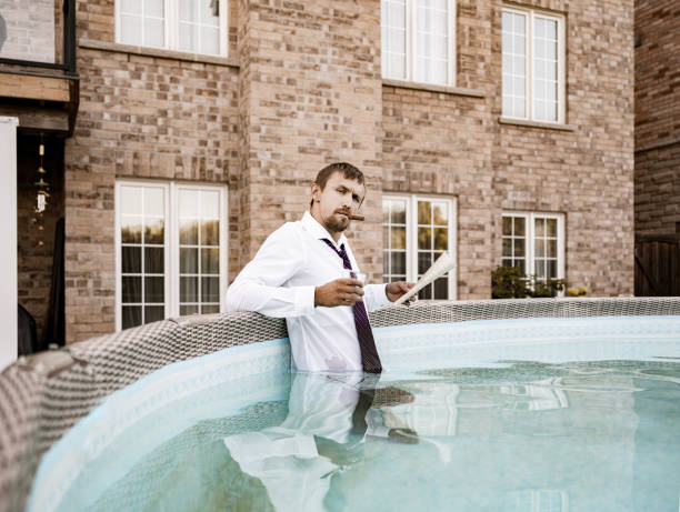 istock Young Oligarch in his pool 1263895815