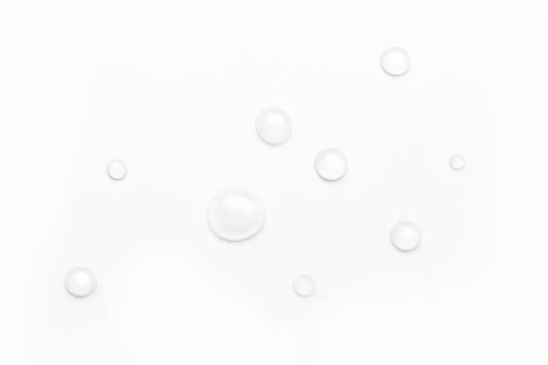 istock drops of water on a white background, top view. minimalism. purity 1263899032