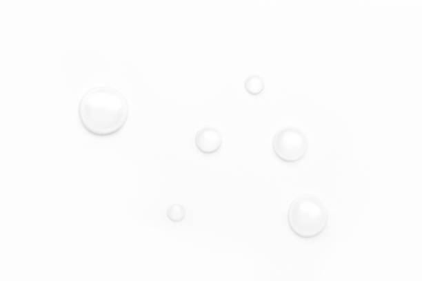 istock drops of water on a white background, top view. minimalism. purity 1263899072