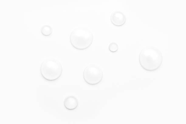 istock drops of water on a white background, top view. minimalism. purity 1263899083