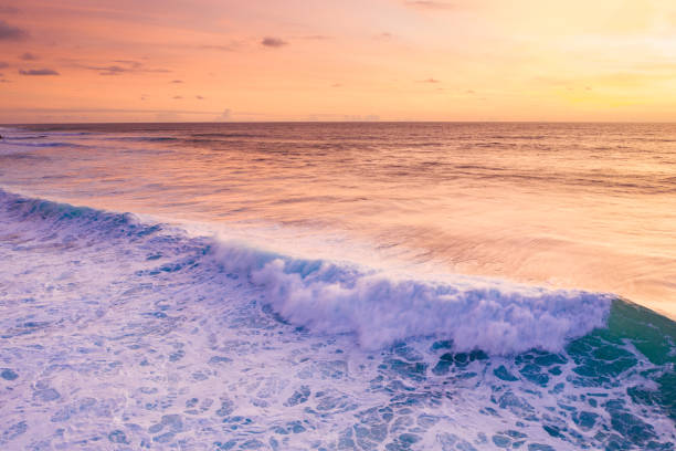 istock Bali, ocean waves in sunset. 1263899373