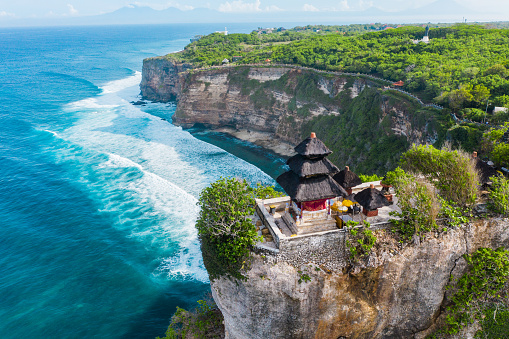 Bali, Pura luhur - temple on the cliff edge in Uluwatu. Ocean on the background.