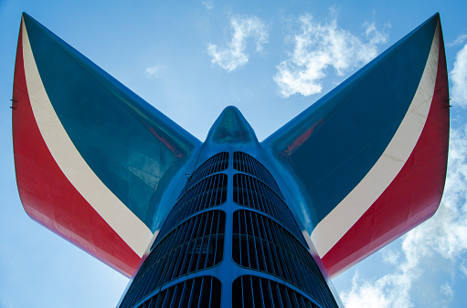 Carnival Cruise ships funnel from bellow deck. The image is taken in International waters on May 25, 2015. Company’s colors and distinctive whale shaped funnel is seen from bellow angle.