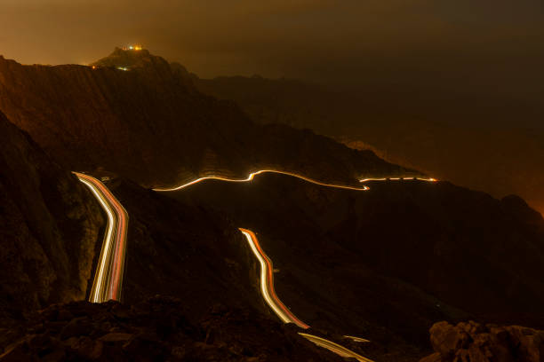 istock Traffic light trails along the zig zag road in Al Hada, Saudi Arabia 1263900930