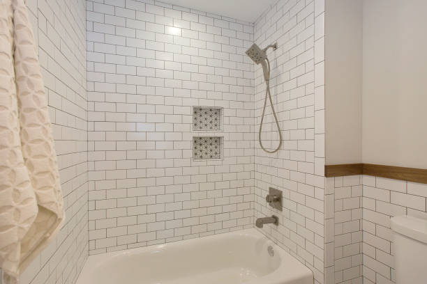 istock Shower and tub combination with beautiful white subway tile 1263902356